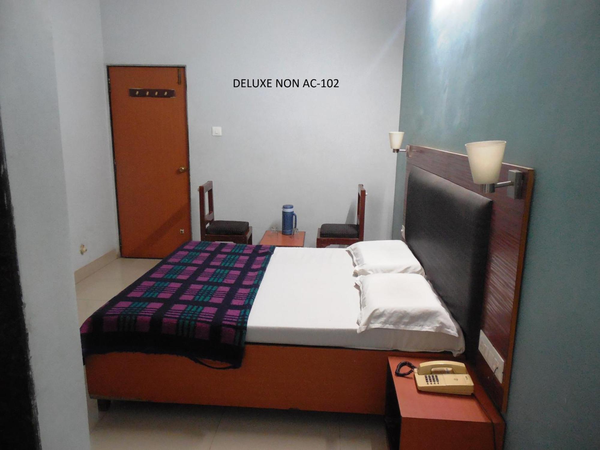 Hotel Silver Springs Ahmedabad Quarto foto